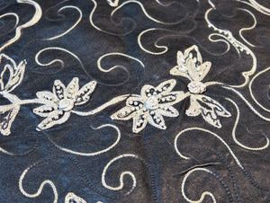Pelle nera ricamo fiori