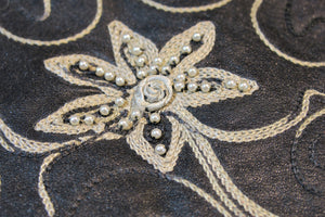 Pelle nera ricamo fiori