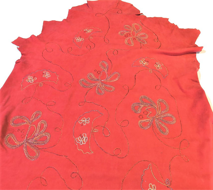 Pelle ricamata nabuk rosso